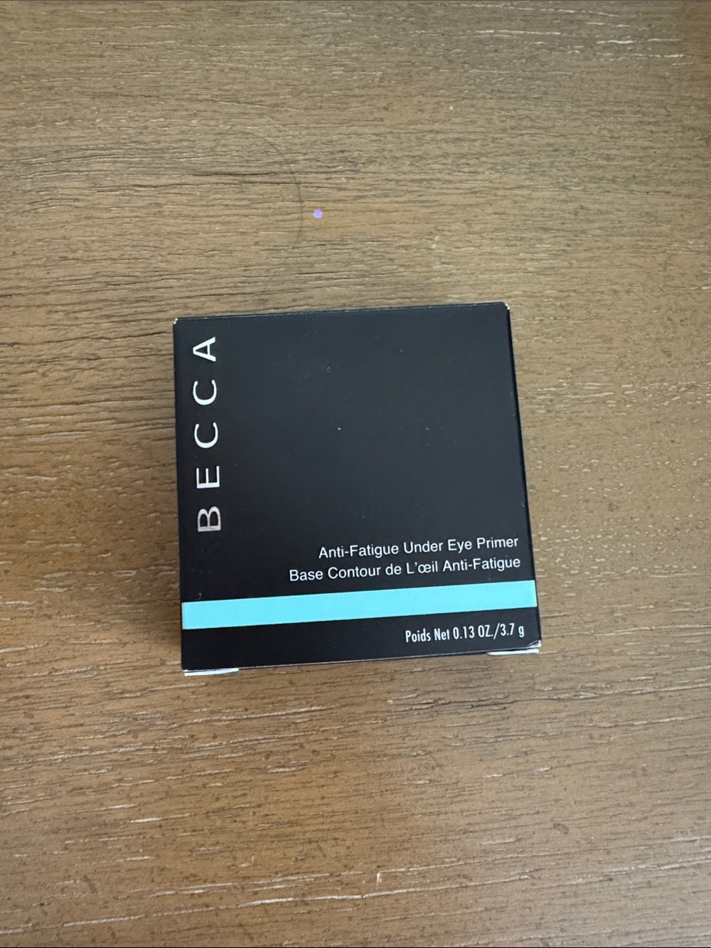 BECCA Anti-Fatigue Under Eye Primer — Black with Aqua Accent